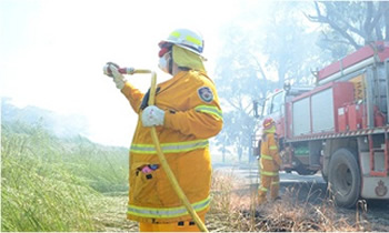 Woman with fire hose