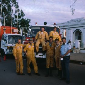 Operational Personal Protective Equipment Yellow Overalls and Group Officer Tony Jones at Nyngan, May 1990.