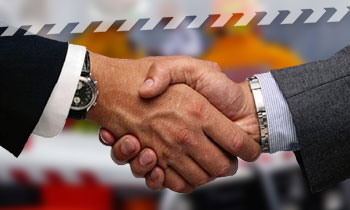 aboutus_business.jpg Shaking hands - doing business with the NSW RFS