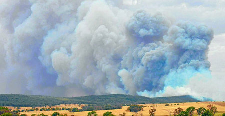 Firefighter efforts contain massive fire