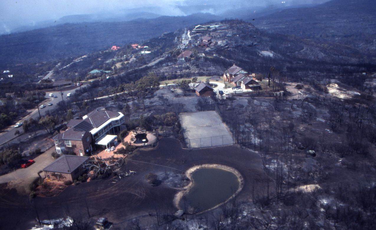 Fires Elanora Heights, January 1994 Some houses are still standing after a fire tears through Elanora Heights during the 1994 Sydney fires.