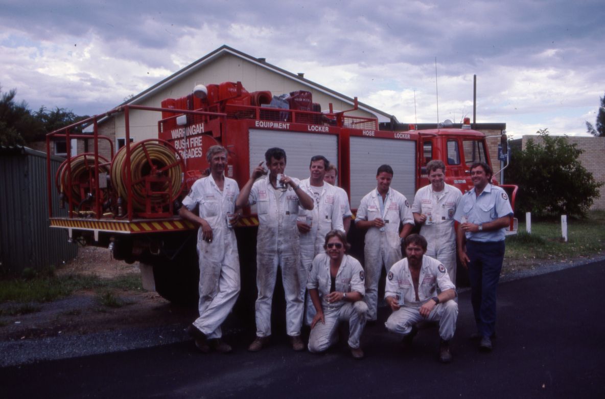 NSW RFS uniform, 1985 Operational Personal Protective Equipment White Overalls and Fire Control Officer Keith Simpson Dress Uniform, 1985.